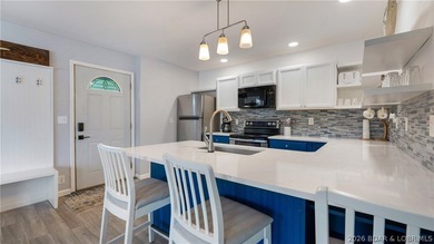 Lakefront living in a wide, quiet cove on the Gravois Arm! - photo 5