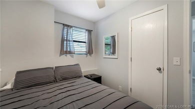 Lakefront living in a wide, quiet cove on the Gravois Arm! - photo 10