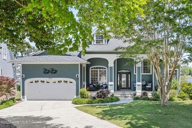 Price Improvement! Waterfront views and a design that refuses to - photo 3