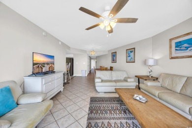 This beautifully maintained four-bedroom, end unit oceanfront