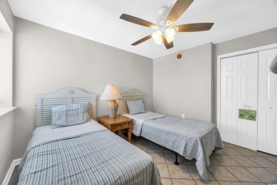 This beautifully maintained four-bedroom, end unit oceanfront