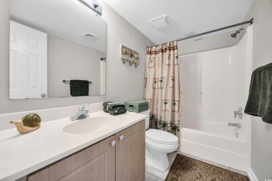 This beautifully maintained four-bedroom, end unit oceanfront