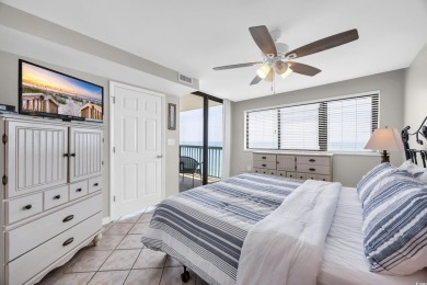 This beautifully maintained four-bedroom, end unit oceanfront