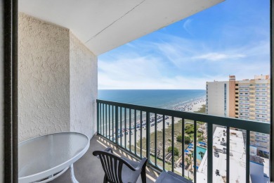 This beautifully maintained four-bedroom, end unit oceanfront