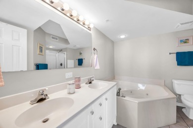 This beautifully maintained four-bedroom, end unit oceanfront