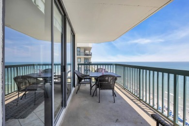 This beautifully maintained four-bedroom, end unit oceanfront