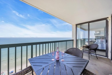 This beautifully maintained four-bedroom, end unit oceanfront
