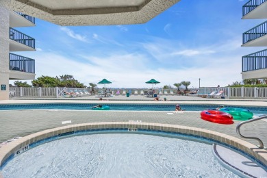 This beautifully maintained four-bedroom, end unit oceanfront