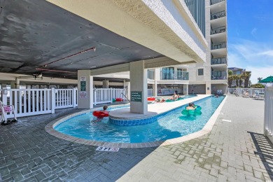 This beautifully maintained four-bedroom, end unit oceanfront