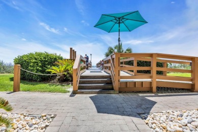 This beautifully maintained four-bedroom, end unit oceanfront