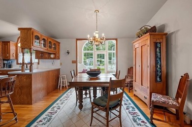 Beautiful arched-window entry welcomes you to this inviting lake - photo 14
