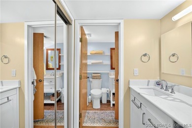 Distinctive architecture meets effortless lake living in this - photo 15