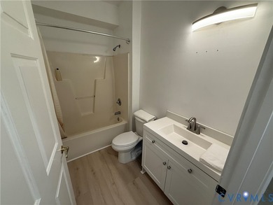 Welcome to this beautifully renovated first-floor condominium - photo 17