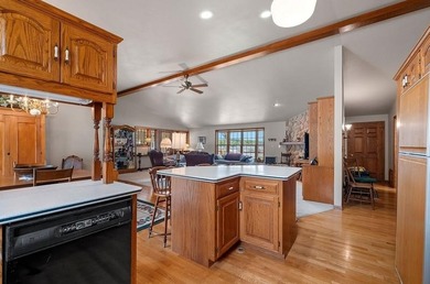 Beautiful arched-window entry welcomes you to this inviting lake - photo 17