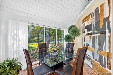 Distinctive architecture meets effortless lake living in this - photo 19
