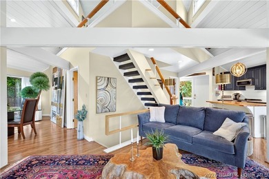 Distinctive architecture meets effortless lake living in this - photo 25