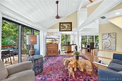 Distinctive architecture meets effortless lake living in this - photo 26