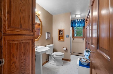 Beautiful arched-window entry welcomes you to this inviting lake - photo 27