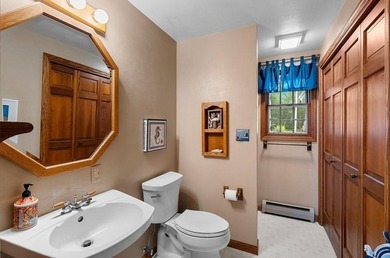 Beautiful arched-window entry welcomes you to this inviting lake - photo 28