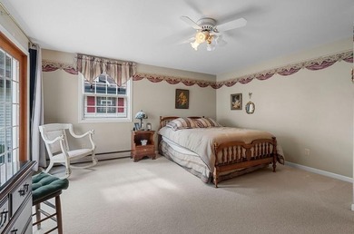 Beautiful arched-window entry welcomes you to this inviting lake - photo 29