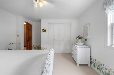 Beautiful arched-window entry welcomes you to this inviting lake - photo 36