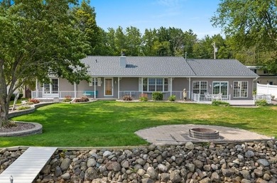 Beautiful arched-window entry welcomes you to this inviting lake - photo 44
