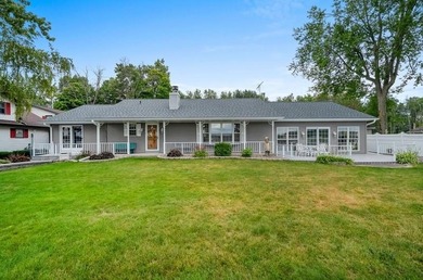 Beautiful arched-window entry welcomes you to this inviting lake - photo 45