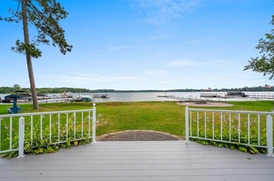 Beautiful arched-window entry welcomes you to this inviting lake - photo 49