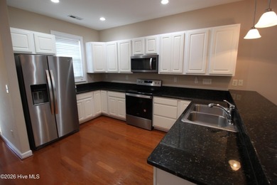 Welcome to Village Green Condos in the wonderful, gated - photo 3