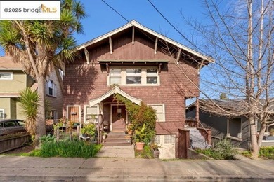 The upstairs unit has Old World charm, hardwood floors - photo 1