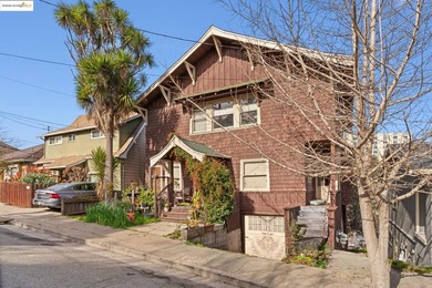 The upstairs unit has Old World charm, hardwood floors - photo 3