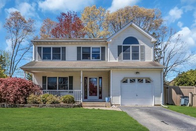 Welcome to 38 Memorial Boulevard, East Moriches Nestled in one - photo 2