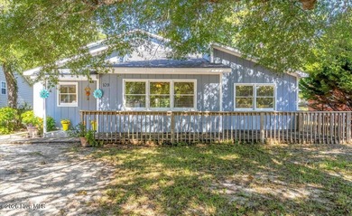 Nestled in Oak Island's highly sought-after Tranquil Harbor - photo 1