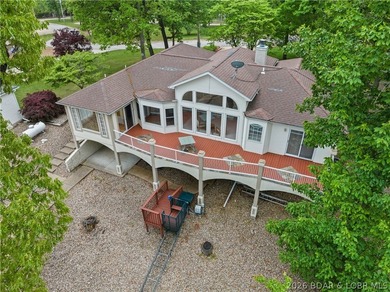 Custom built Home with great Lake View. Covered Porch has Entry - photo 1