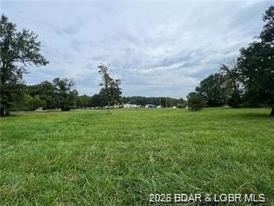 Very Gentle lake access lot located at the corner of Towering - photo 1
