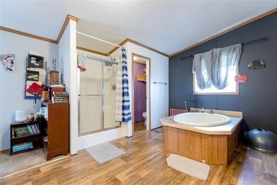 This 4-bedroom, 2-bath manufactured home offers comfortable - photo 9