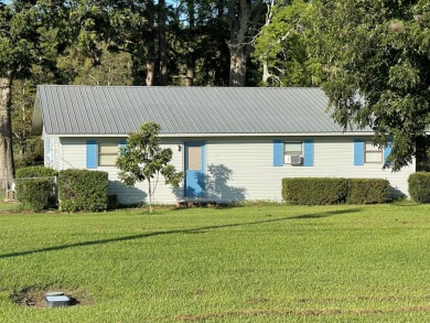 Just 200 yards from the main lake.   This 4 bedroom, 2 bath home - Lake Home For Sale in Saint Joseph, Louisiana