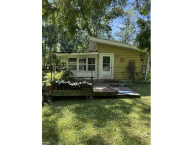 Lake Home Sale Pending in Weidman, Michigan