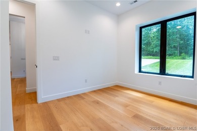 NEW CONSTRUCTION in Porto Cima! This modern ranch delivers the - photo 11