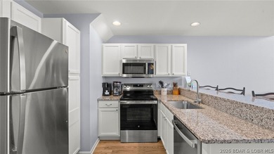 Welcome to this beautiful top-floor, turnkey condo in the heart - photo 5