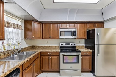 Welcome to this well-maintained condo located at 5900 NW 44th St - photo 17