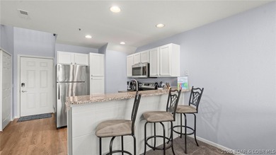 Welcome to this beautiful top-floor, turnkey condo in the heart - photo 8
