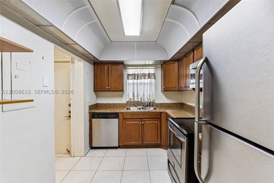 Welcome to this well-maintained condo located at 5900 NW 44th St - photo 18