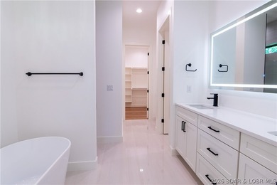 NEW CONSTRUCTION in Porto Cima! This modern ranch delivers the - photo 34