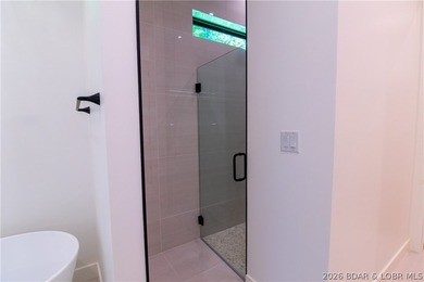 NEW CONSTRUCTION in Porto Cima! This modern ranch delivers the - photo 35