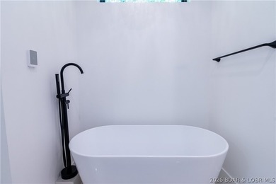 NEW CONSTRUCTION in Porto Cima! This modern ranch delivers the - photo 38