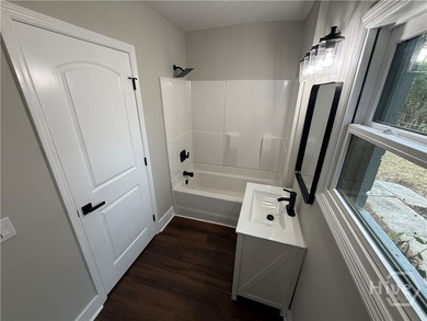 Welcome home! This four bedroom, two bath home is move-in ready - photo 14