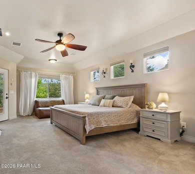 This charming 2013 single-level Tuscan Style custom residence in