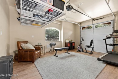 This charming 2013 single-level Tuscan Style custom residence in