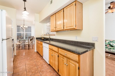 Furnished condo in an absolutely fantastic location! Situated on